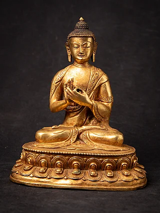 Old bronze Nepali Buddha statue