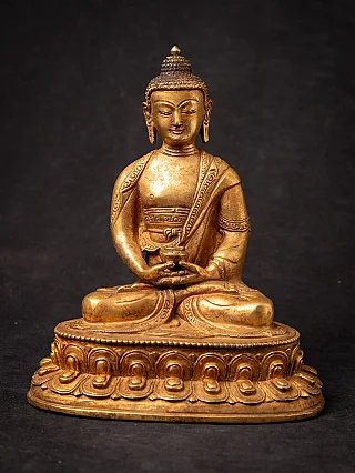 Old bronze Nepali Buddha statue