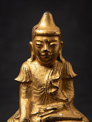 Antike hölzerne burmesische Buddhafigur