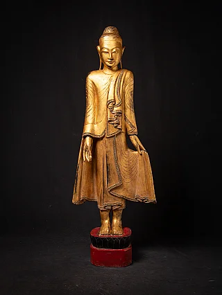Antique wooden Mandalay Buddha statue