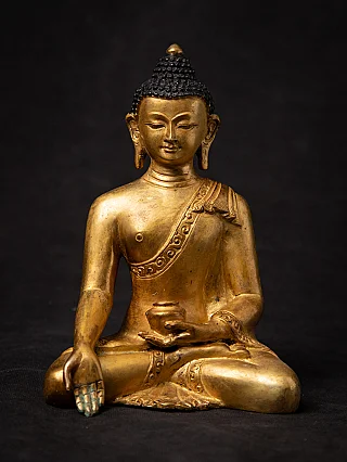 Old bronze Nepali Buddha statue