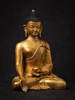 Old bronze Nepali Buddha statue
