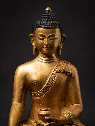 Old bronze Nepali Buddha statue