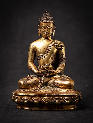 Old bronze Nepali Buddha statue