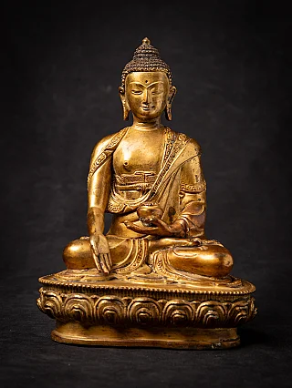 Old bronze Nepali Buddha statue