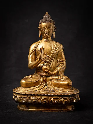 Old bronze Nepali Buddha statue