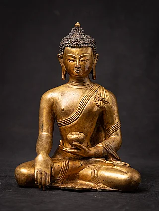 Old bronze Nepali Buddha statue