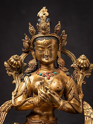 Old gilded bronze seated Tara in vajra (lotus) position