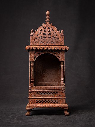 Old metal Buddhist shrine