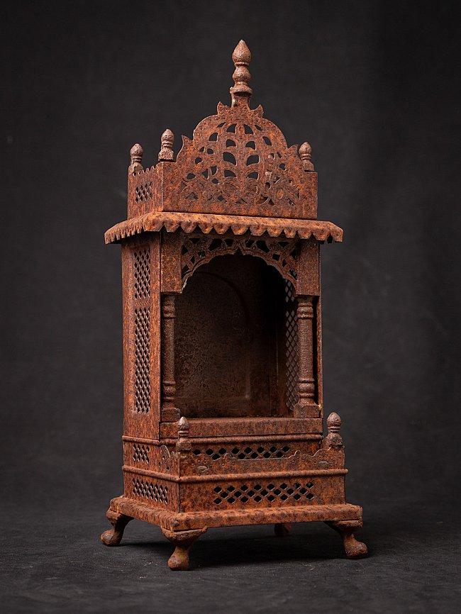 Old metal Buddhist shrine