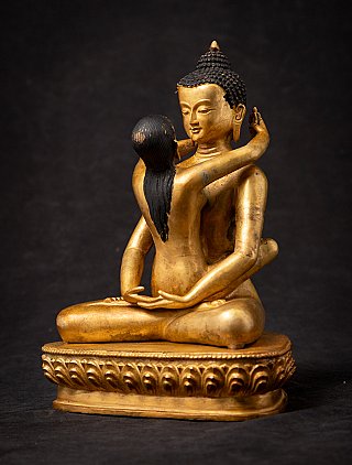 Nepalese bronzen Samantabhadra in zittende houding, driekwartaanzicht met omarmende partner