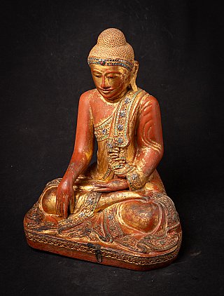 Antiker hölzerner burmesischer Mandalay-Buddha