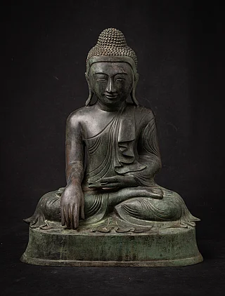 Old bronze Burmese Mandalay Buddha