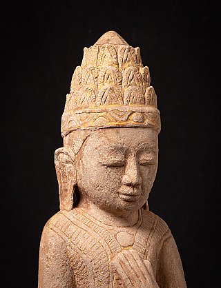 Antique sandstone Burmese Buddha statue