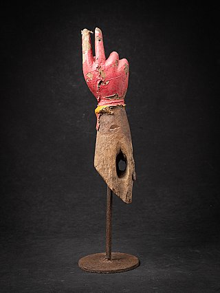 Antique wooden arm of a Hindu god