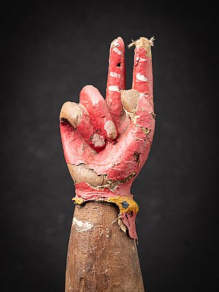Antique wooden arm of a Hindu god