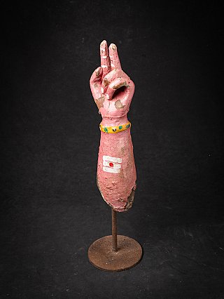 Antique wooden arm of a Hindu god