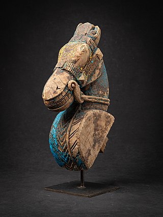 Antique wooden temple fragment of a Horse head