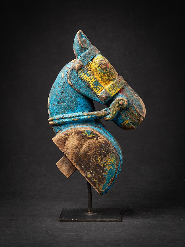 Antique wooden temple fragment of a Horse head