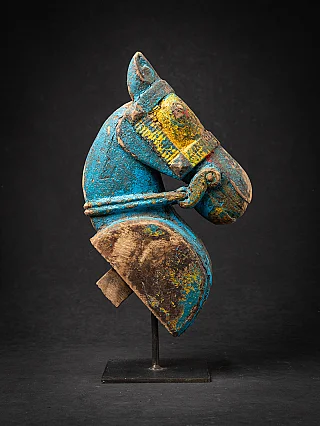 Antique wooden temple fragment of a Horse head