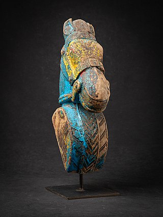 Antique wooden temple fragment of a Horse head