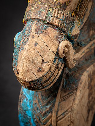 Antique wooden temple fragment of a Horse head