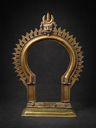 Ancient Indian bronze Prabhavali temple arch with Kirtimukha