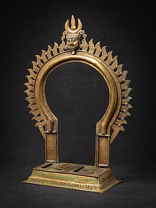 Ancient Indian bronze Prabhavali temple arch with Kirtimukha