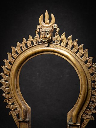 Ancient Indian bronze Prabhavali temple arch with Kirtimukha