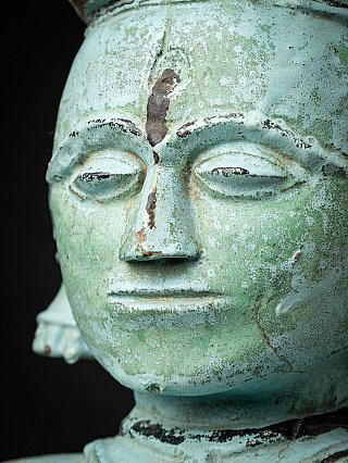 Antique wooden Indian statue of a mother figure with child