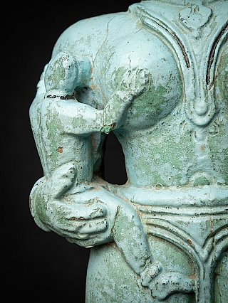 Antique wooden Indian statue of a mother figure with child
