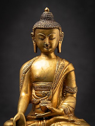 Old bronze Nepali Buddha statue