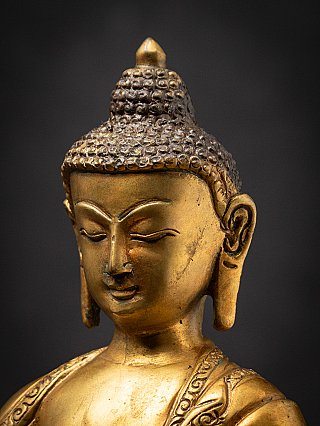 Old bronze Nepali Buddha statue