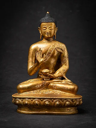 Old bronze Nepali Buddha statue