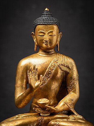 Old bronze Nepali Buddha statue