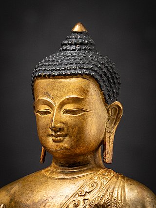 Old bronze Nepali Buddha statue