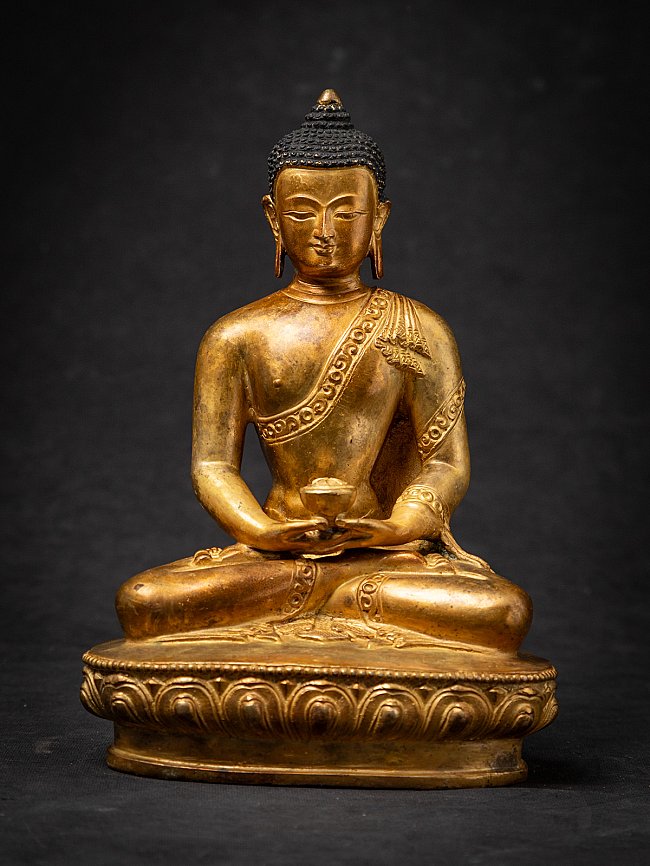 Old bronze Nepali Buddha statue