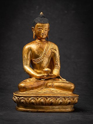 Old bronze Nepali Buddha statue
