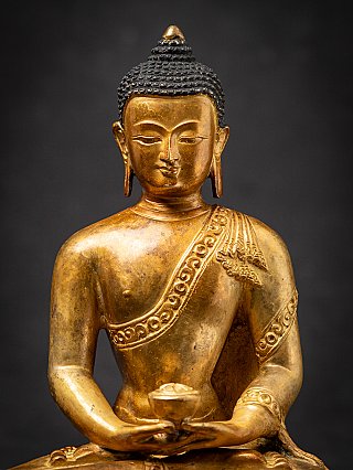 Old bronze Nepali Buddha statue
