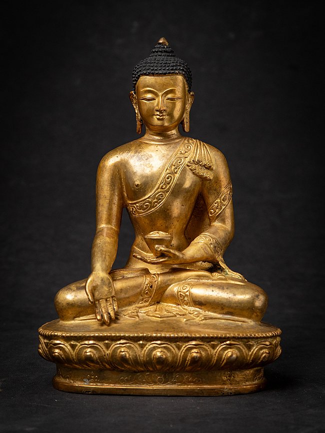 Old bronze Nepali Buddha statue