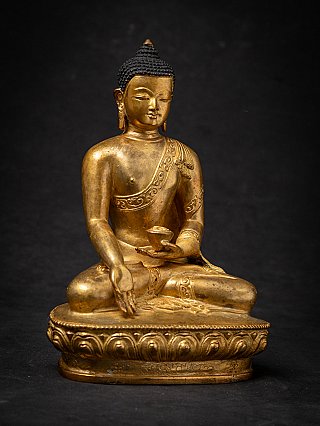 Old bronze Nepali Buddha statue