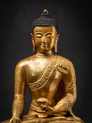 Old bronze Nepali Buddha statue