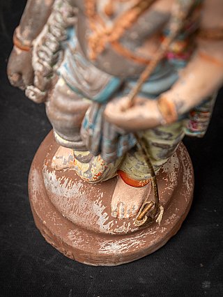Antique pottery statue of Rama