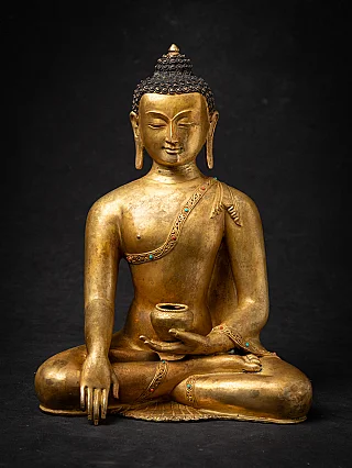 Old bronze Nepali Buddha statue