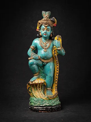 Antique pottery Krishna statue