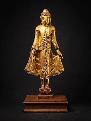 Beautiful antique wooden standing Mandalay Buddha