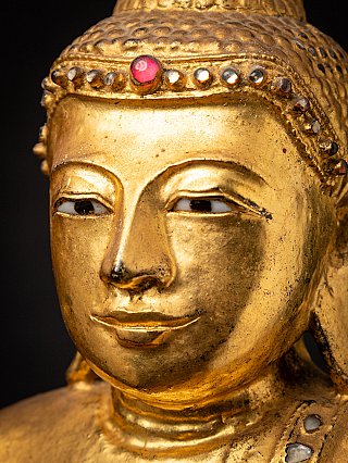 Beautiful antique wooden standing Mandalay Buddha