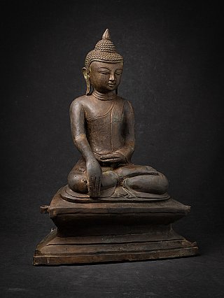 Old bronze Burmese Buddha statue