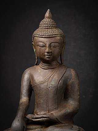 Old bronze Burmese Buddha statue