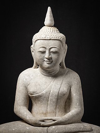 Old marble Burmese Buddha statue